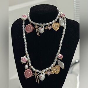 Elegant Pearl And Gold Charm Necklace